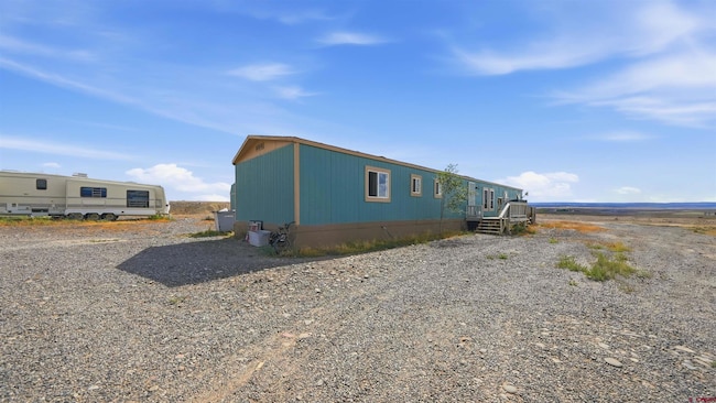 4995 Sundown Rd, Delta — home on a hilltop acreage with open valley views